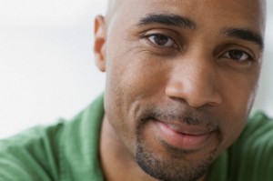 Close-up of African American man with serious look.