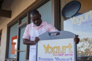 Man opening frozen yogurt store