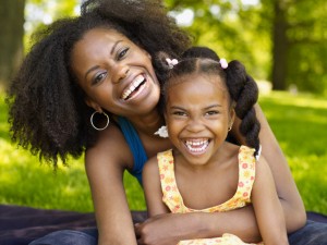 mother and daughter laughing