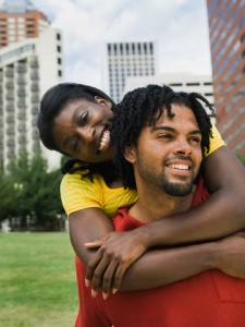 Couple hugging in urban park