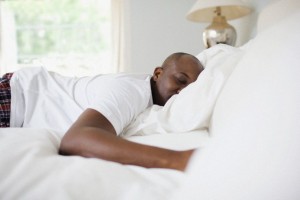 Man asleep in bedroom