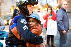 ferguson - kid hugging cop