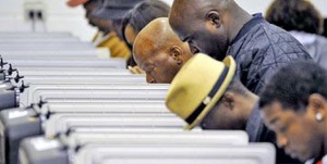 black-men-voting-booth-2015