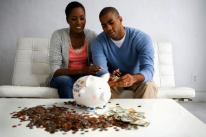 Young African American couple discusses finances