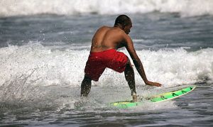 2016-black-man-surfing