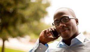 2016-black-man-outside-cellphone