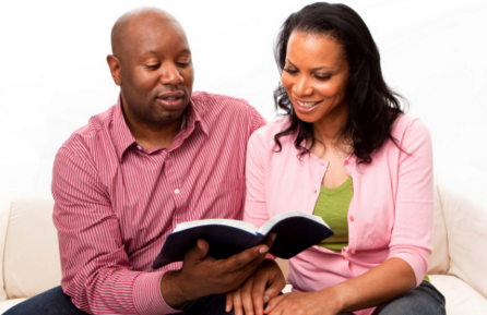 African American Couple - Reading Bible.