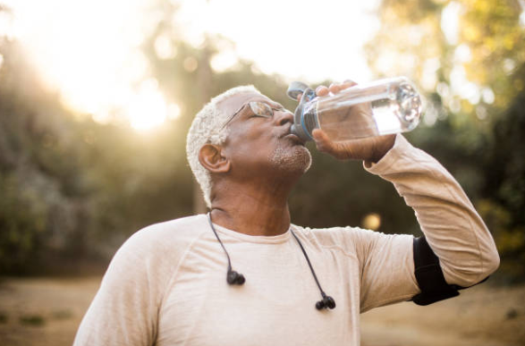 black man drinking water 2022