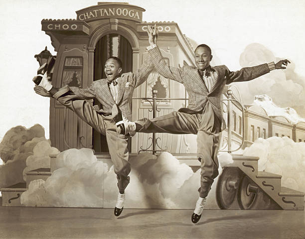 Black Men Tap Dancing.