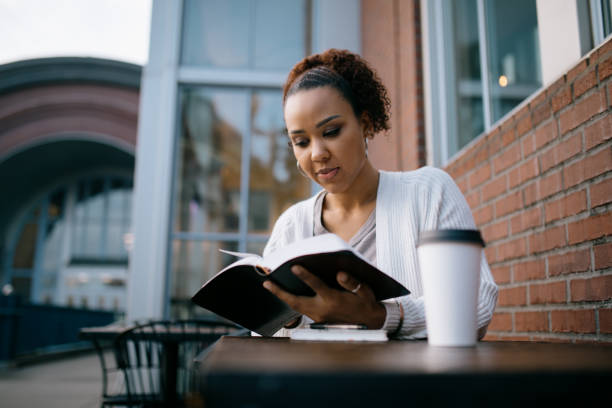 Black Woman - Reading the Bible.