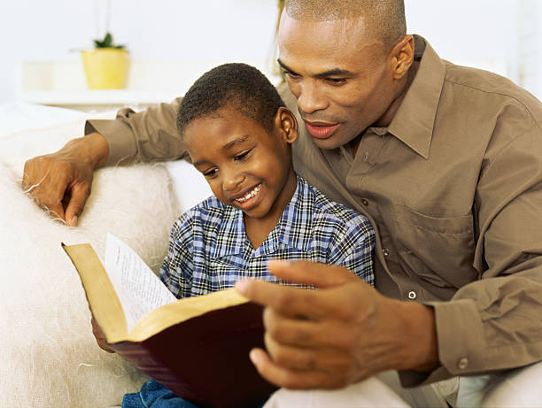 Black Father and Son. Bible Study.