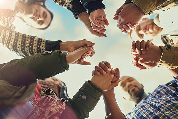 Christians - Holding Hands and Praying.