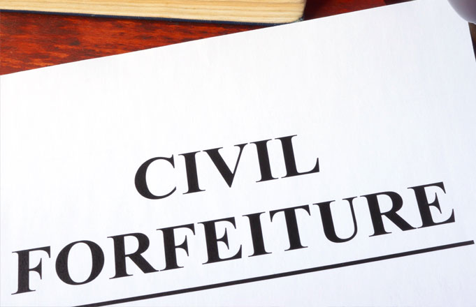 Black Americans, Asian Americans, Mexican Americans, and White Americans: Guardians or Gangsters? The dark side of civil asset forfeiture.